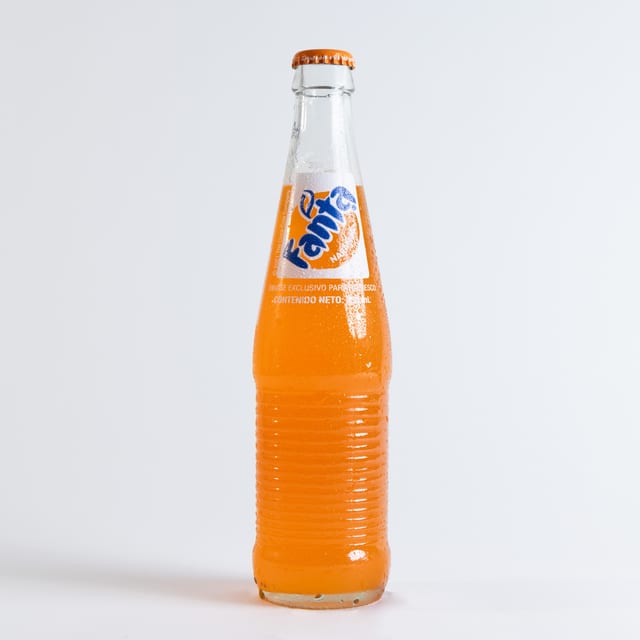Orange Fanta Mexican 12 Oz Bottle.